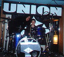Union drummer Brent Fritz with a young fan